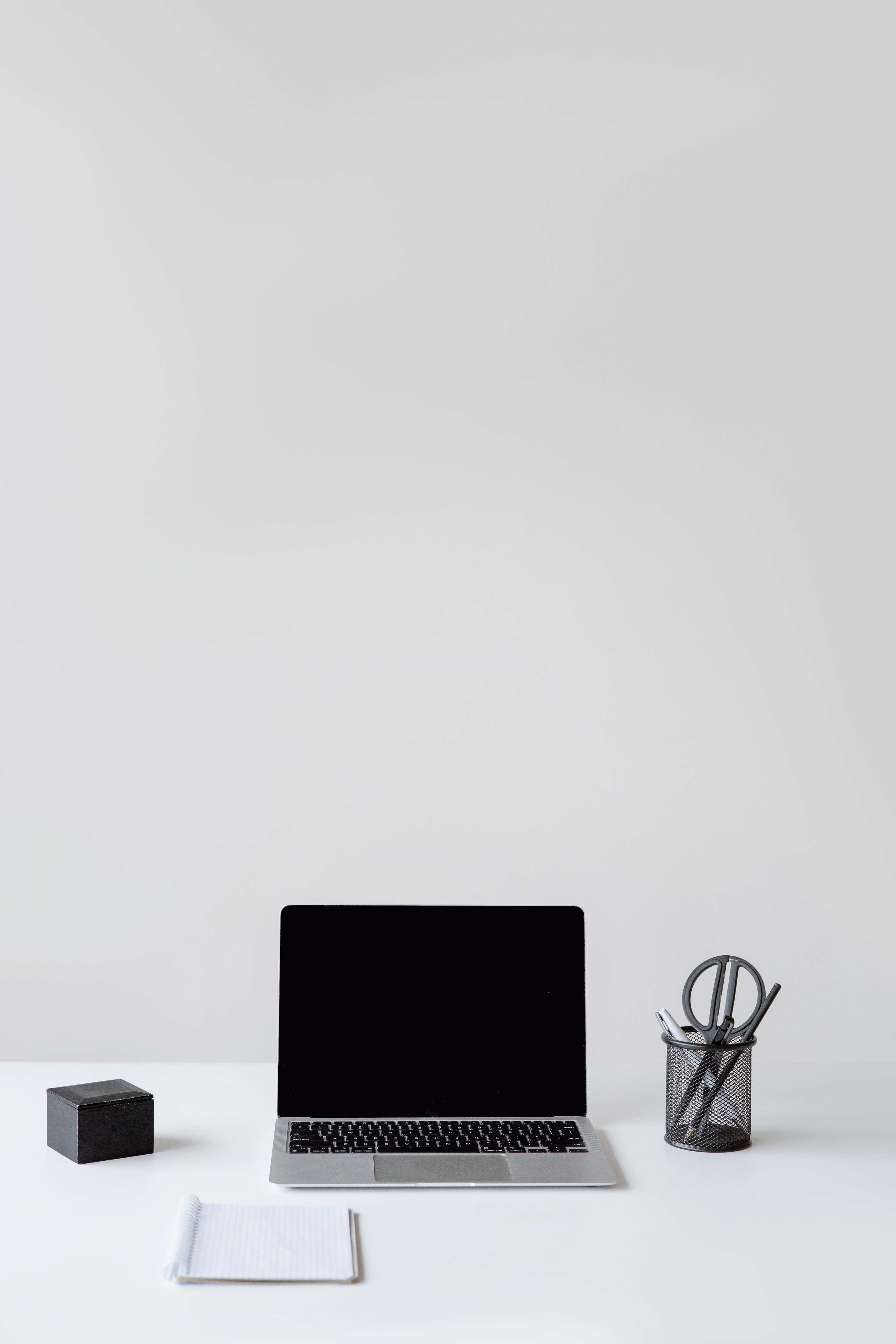 Desk with monitors used for database analysis and query review